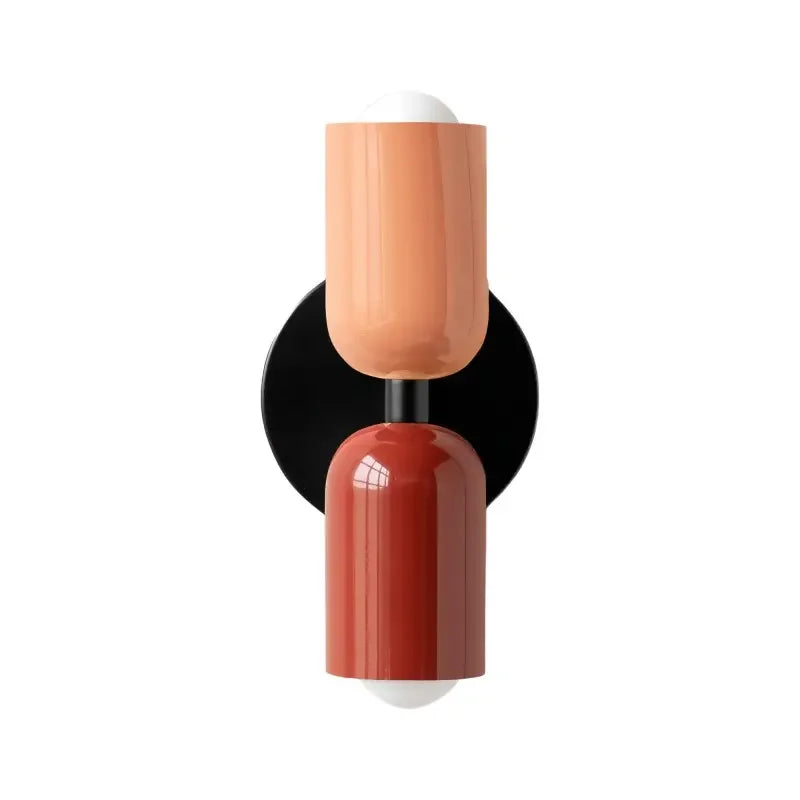 Pastellgrön vägglampa Macaron i metall i en hall